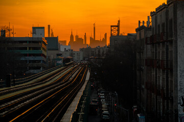 Fototapeta na wymiar NYC Skyline Sunset with Uptown Train