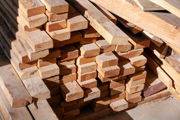 Large stack of fresh structural lumber insolated