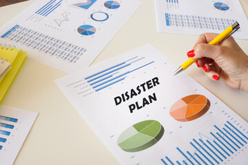 Conceptual photo about DISASTER PLAN with handwritten phrase.