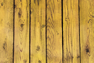 Naklejka premium Vertical boards in yellow. Yellow fence. Background
