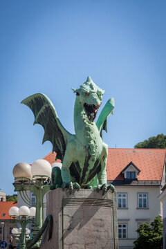 Close up on Dragon statue on zmajski most, or zmajev most (Dragon bridge) in Ljubljana, capital city of Slovenia from the late 19th century. The dragon is the symbol of the city, protecting it.....