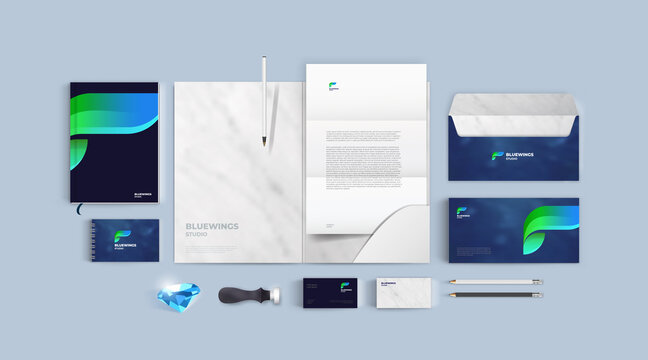 Branding design with blue wings logo and stone texture. Colorful corporate identity set of folder and business card, letter A4 and envelope. Stationery editable vector high quality mockup.