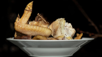 Boiled chicken in a plate. A carnivorous diet.