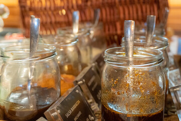 Sauce jars in a self-service restaurant