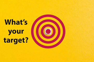 Dartboard drawn on yellow background with question WHAT'S YOUR TARGET?