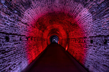 The brick-lined walls of Canada's first railway tunnel, built in Brockville in 1860, are lit up in multi-coloured lights as a tourist attraction.