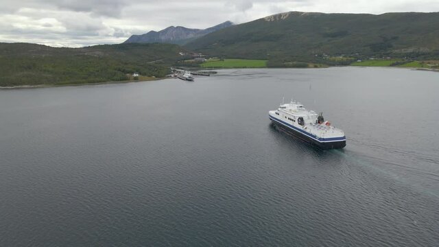 Aerial tracking shot of Ferry cruising from Lodingen to Bognes in Northern Norway