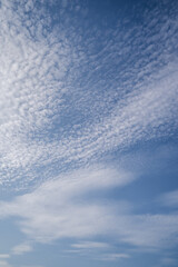 Natural background with blue sky and white clouds.