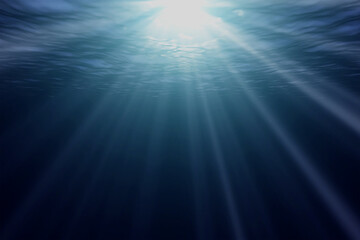 Rays of sun under water. The ocean is quiet.