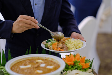 scooping the food, catering, dinner time
