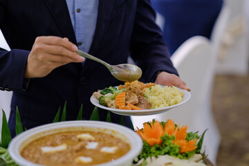 scooping the food, catering, dinner time
