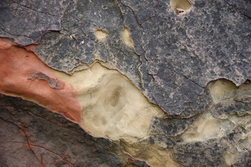Colorful surface of a weathered sandstone boulder