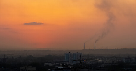 Fototapeta na wymiar air pollution in the city. pipes smoke