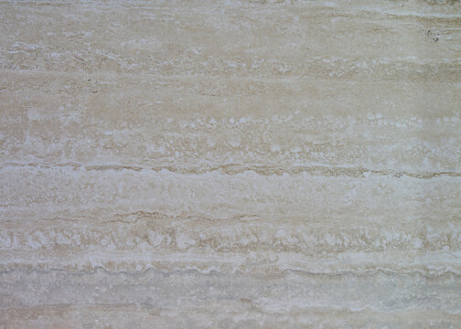 Mosaico decorativo con textura rugosa de color beige ideal para pisos y paredes