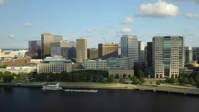 Cambridge, Massachusetts Skyline on Beautiful Summer Day from Charles River. Aerial Drone Shot
