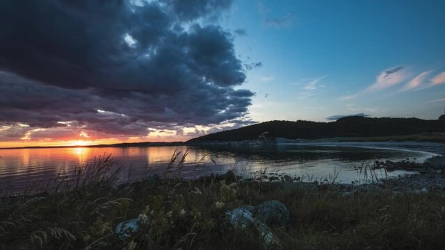 Dark Clouds Over Breivika Bay In Donna Island, Helgeland, Norway During Sunset. timelapse