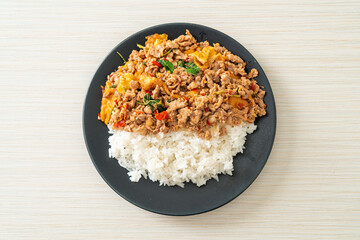 stir-fried minced pork with basil and egg topped on rice