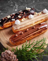 eclairs in a cut on a dark background