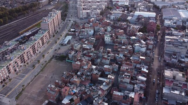 Aerial flyover poor neighborhood named Villa 31 in Buenos Aires - Slums with old destroyed buildings in Argentina