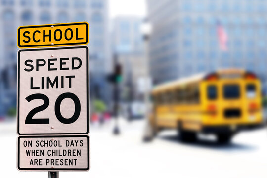 Traffic sign.  School zone  yellow warning board. Speed limit 20