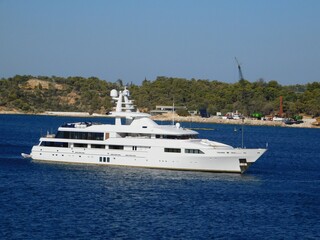 Obraz na płótnie Canvas A luxury yacht near the coast of Vouliagmeni in Attica, Greece