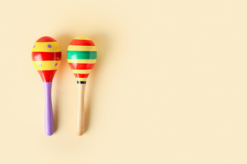 Mexican maracas on color background