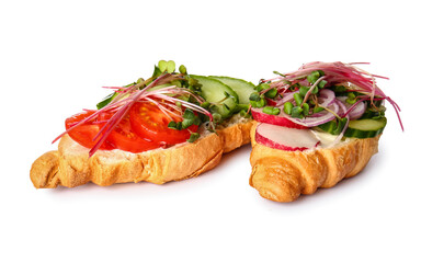 Tasty croissants with vegetables and micro green on white background