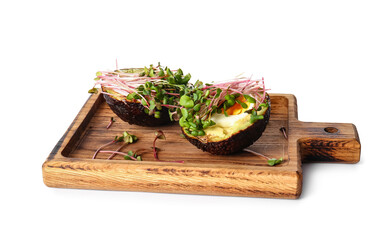 Tasty avocado with boiled egg and micro green on white background