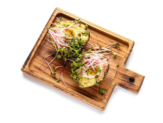 Tasty avocado with boiled egg and micro green on white background