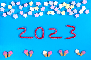 new year concept. text 2023 made from gummies