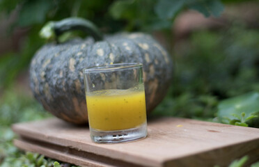 Fresh squash juice isolated on the garden,concept and idea of food countryside style.