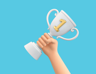 Hand holding white champion cup trophy isolated on blue. Clipping path included