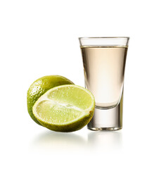 Shot of tasty tequila with lime on white background
