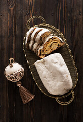 Christmas stollen top view, on wooden background