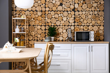 Interior of stylish kitchen with dining table