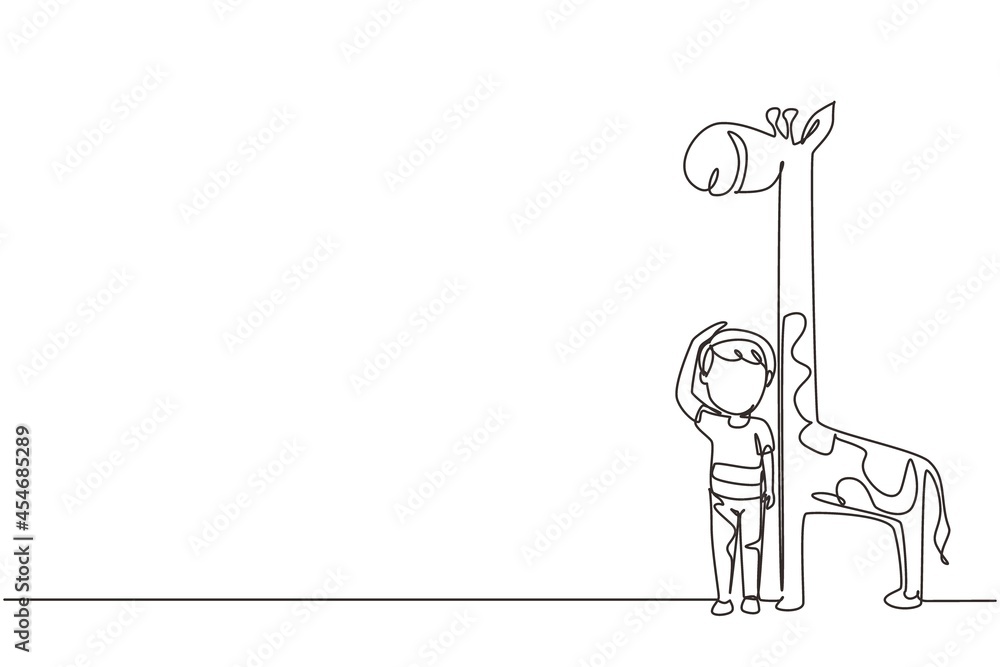 Poster single continuous line drawing little boy measuring his height with giraffe height chart on wall. ki