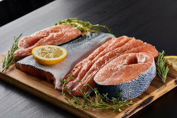 Raw salmon fillets and medallions