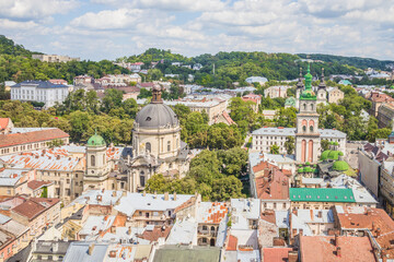 Fototapeta na wymiar View of historical old city district of Lviv, Ukraine. Old buildings and courtyards in historic Lviv