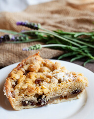 slice of Apple crumble pie with rustic background and rough textures