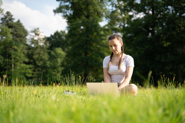 Girl computer tablet work outside. Student woman outdoor with business online technology in summer nature park. Person people with laptop. Happy hipster young distance learning concept.