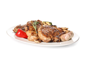 Plate with tasty pork steak and grilled vegetables on white background