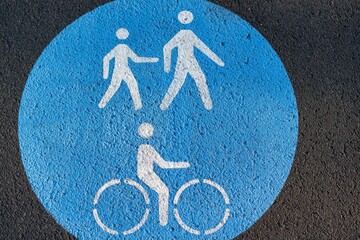 Shared path sign on shared pathway for bicycle riding lane and pedestrian path