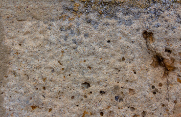 Texture of rocky stone with pores. copy space.