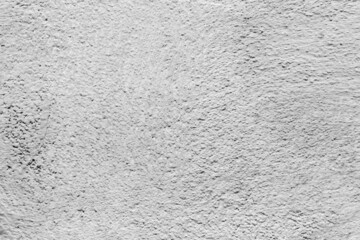 Wall texture with white paint and lumps. Copy space.