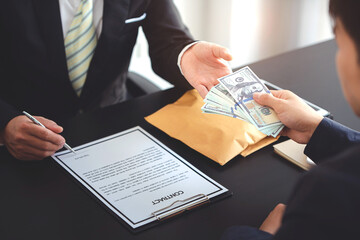 business people negotiating contracts Collaborate on paperwork at the desk and sign a contract.