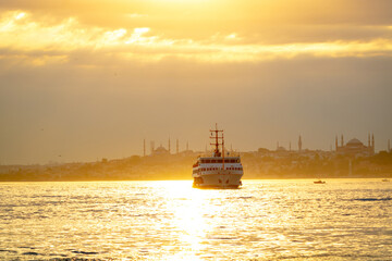 Istanbul inline ferry and cityscape of Istanbul at sunset. Public transportation in Istanbul....