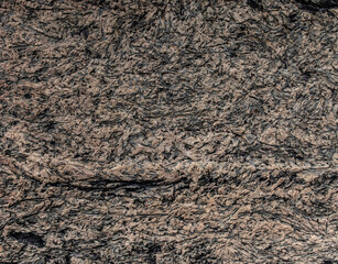 Background of the clay and burn out hay wall. The texture of the old clay wall