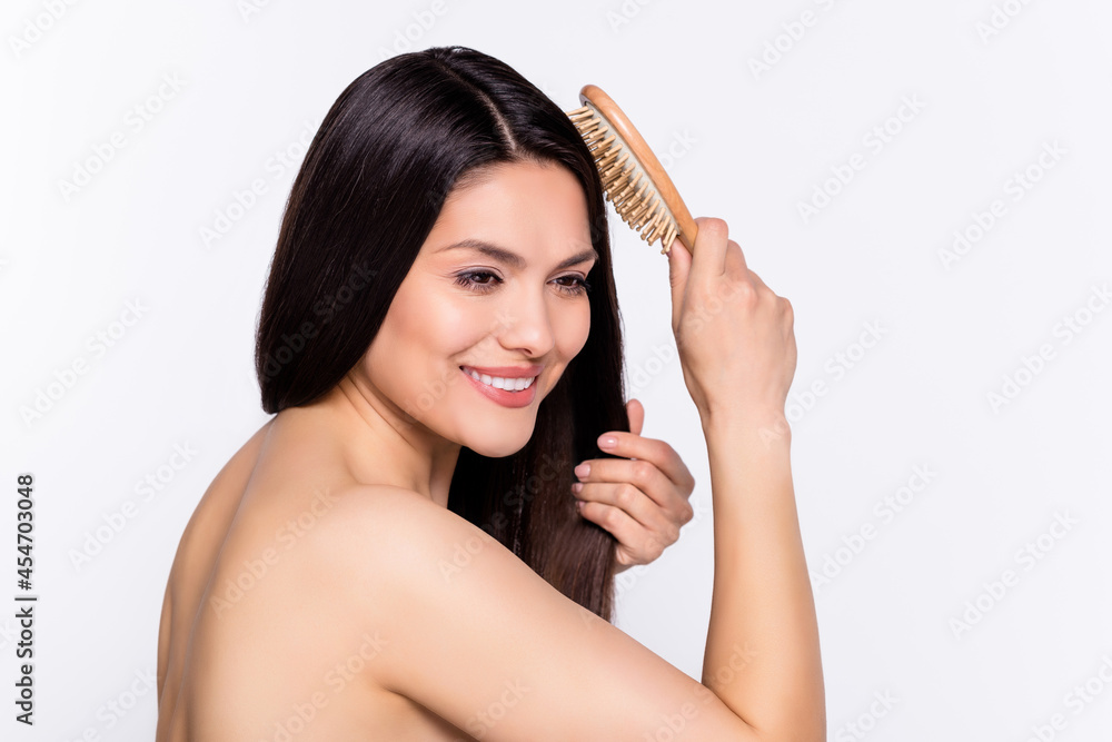 Poster Side photo portrait brunette woman brushing hair smiling isolated white color background