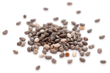 Micro close-up and details of Organic Indian organic chia seed (salvia hispanica ) isolated over white background.