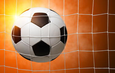 soccer ball in goal
